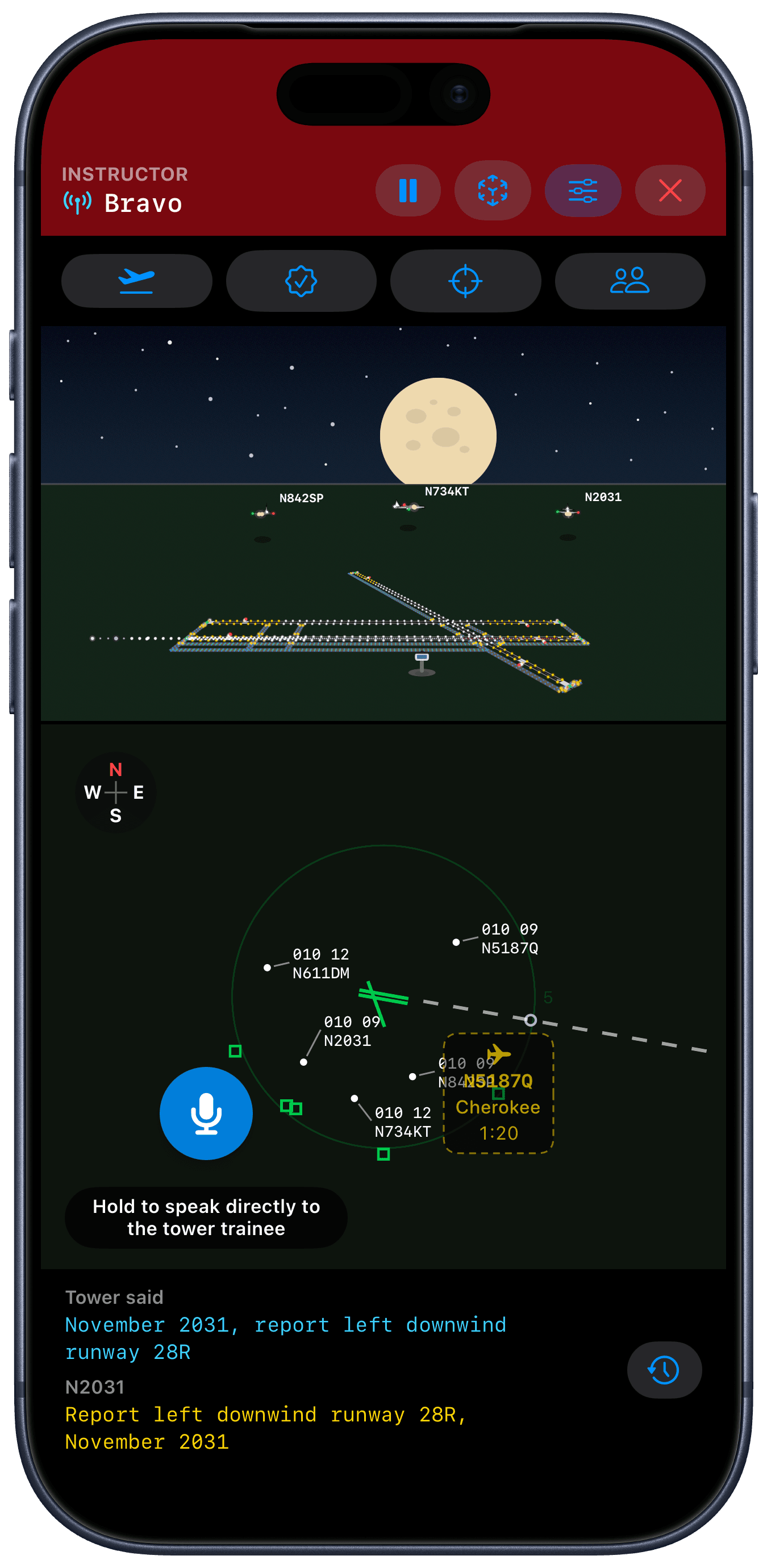 Instructor guiding a live Tower Simulator session at night